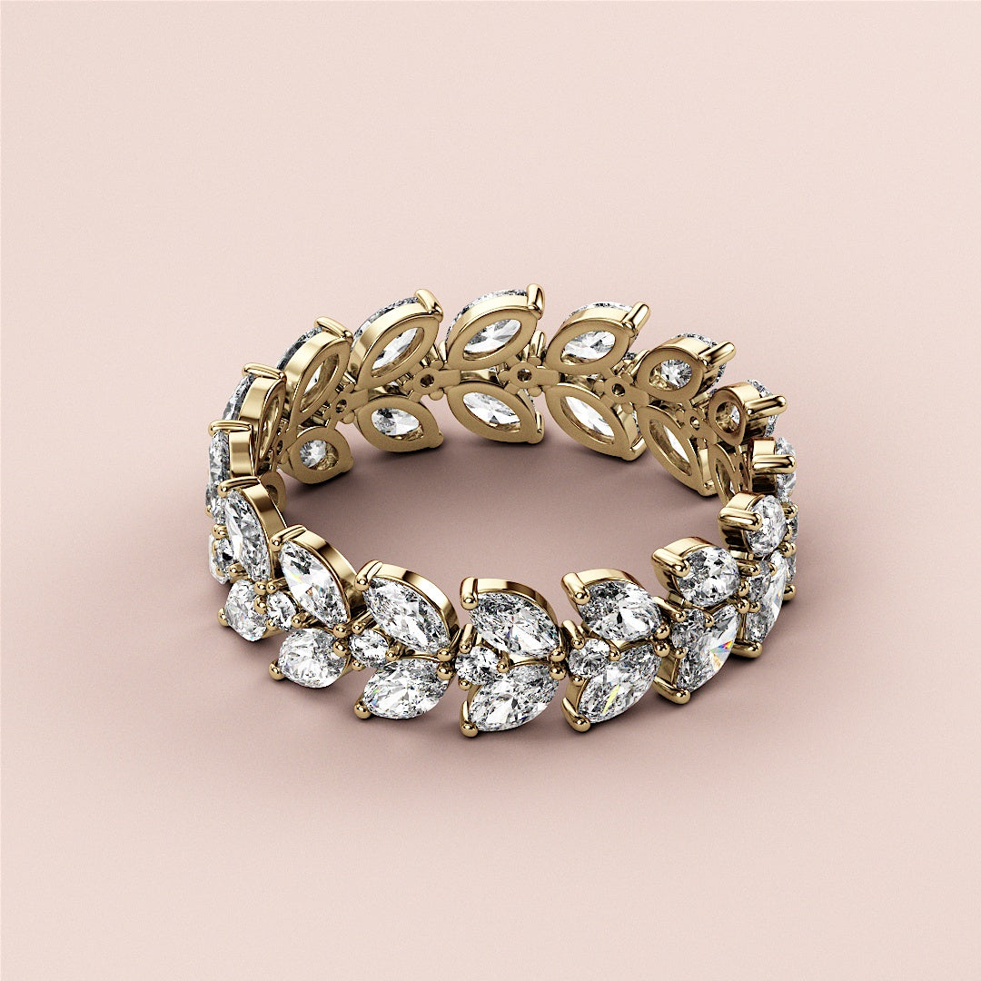Luxurious 14K or 18K gold eternity wedding band, featuring marquise-cut diamonds for elegance and sophistication. |
 
 
 #14KRecycledYellowGold
 #18KRecycledYellowGold