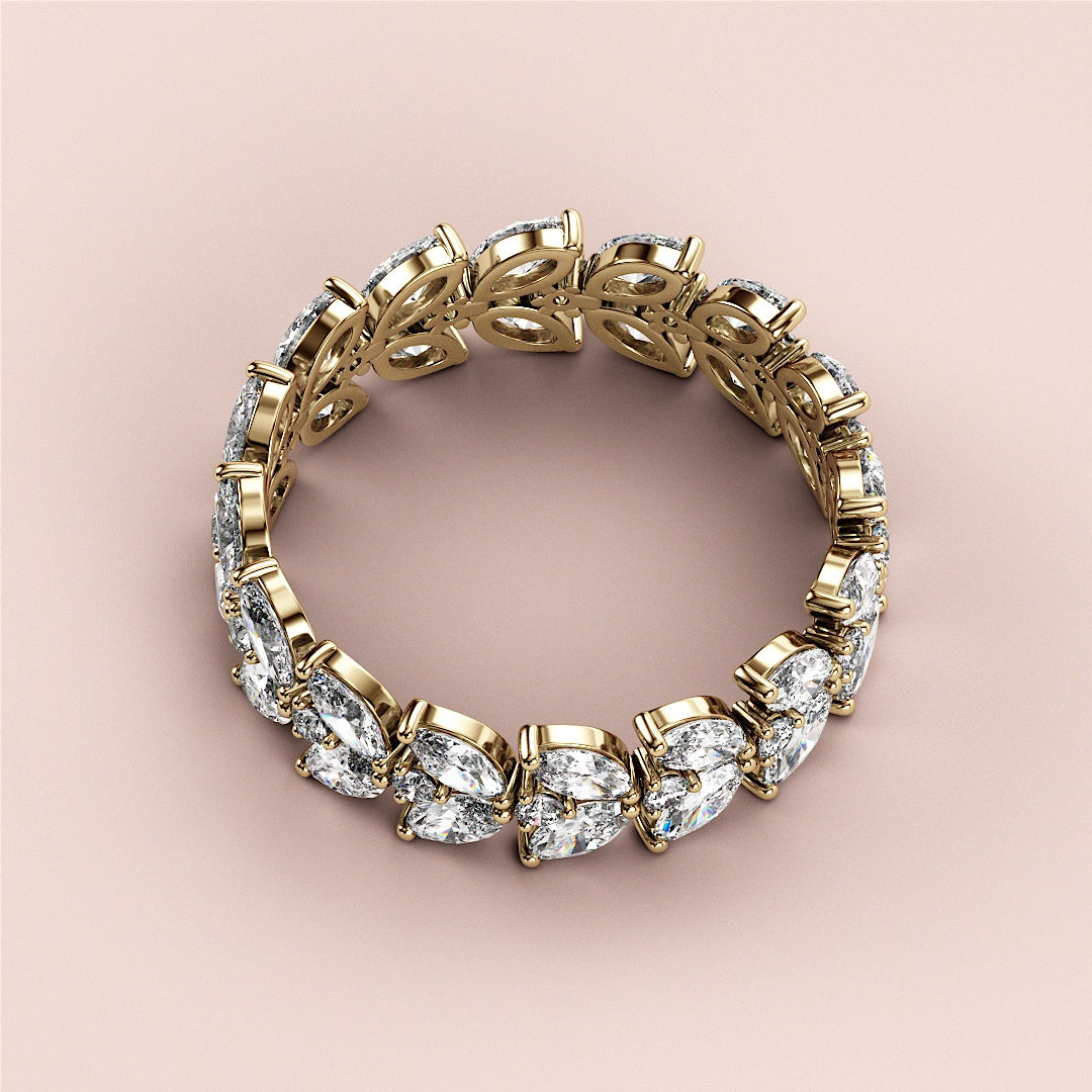Elegant 14K/18K gold marquise and round diamond eternity band, perfect for weddings or special occasions.  Jewelry not worn on model. |
 
 
 #14KRecycledYellowGold
 #18KRecycledYellowGold