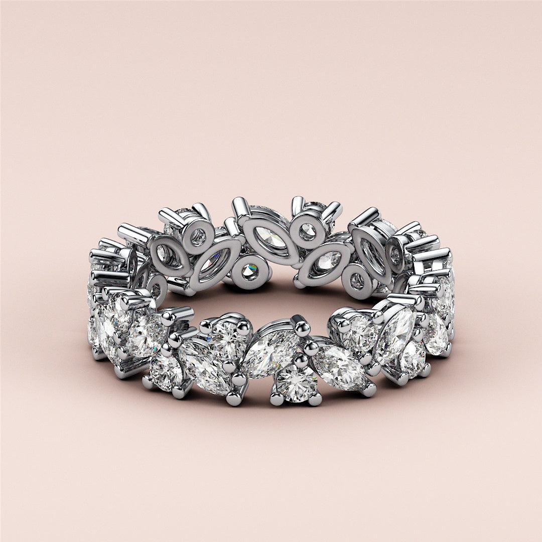 Stunning 14K or 18K gold platinum eternity band with pear, marquise, and round diamonds for the perfect wedding ring. |
 #14KRecycledWhiteGold
 #18KRecycledWhiteGold
 
 
 
 
 #Platinum
