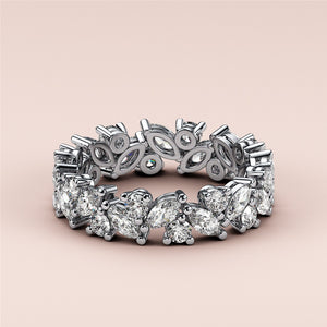 Stunning 14K or 18K gold platinum eternity band with pear, marquise, and round diamonds for the perfect wedding ring. 