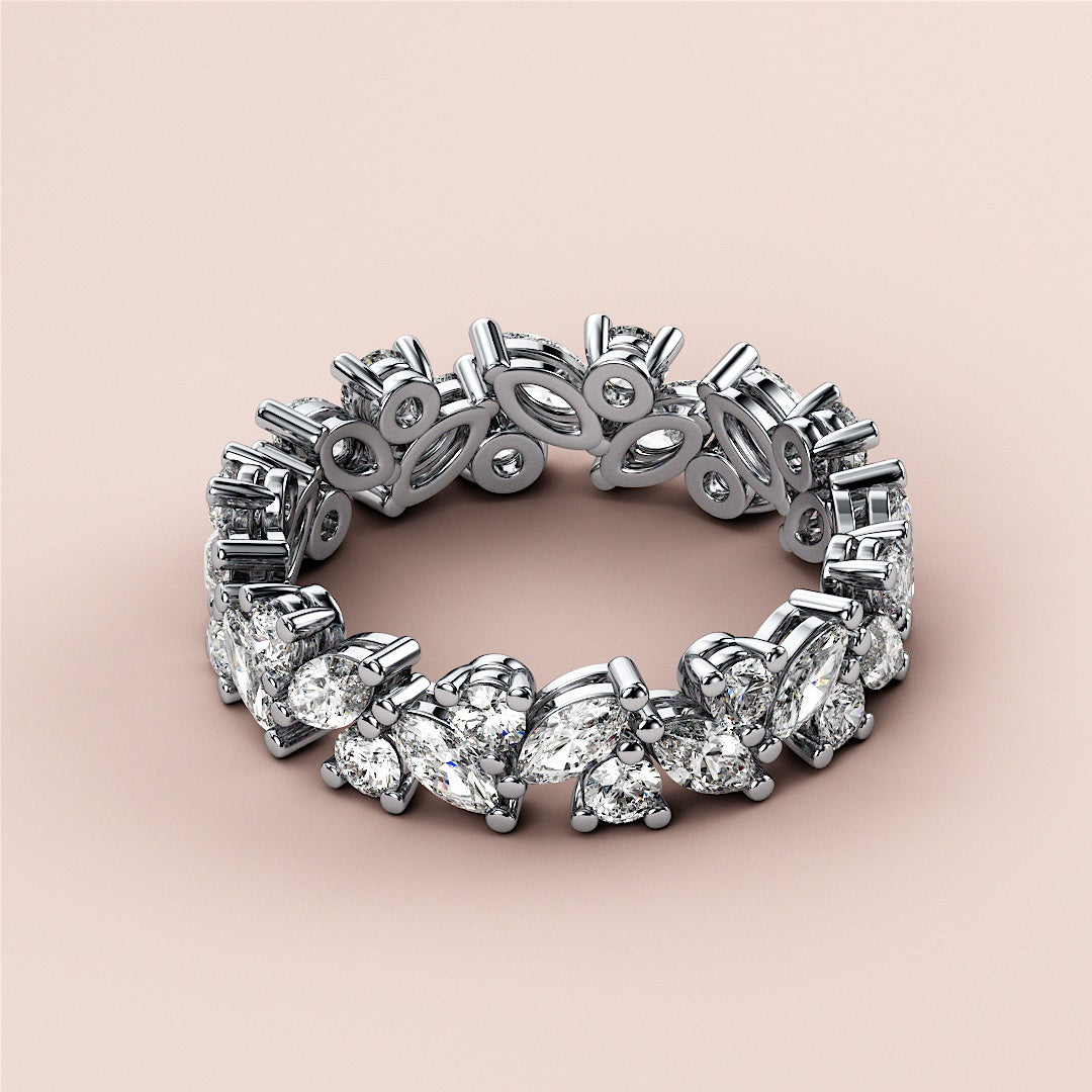 Elegant marquise-cut diamond eternity wedding band in 14K and 18K white gold or platinum, perfect for a sophisticated look. |
 #14KRecycledWhiteGold
 #18KRecycledWhiteGold
 
 
 
 
 #Platinum