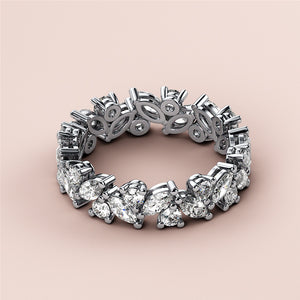 Elegant marquise-cut diamond eternity wedding band in 14K and 18K white gold or platinum, perfect for a sophisticated look. 