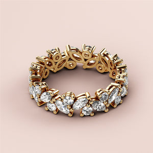 Elegant 14K gold eternity wedding band with marquise-cut diamonds, showcasing intricate design.  No model present. 