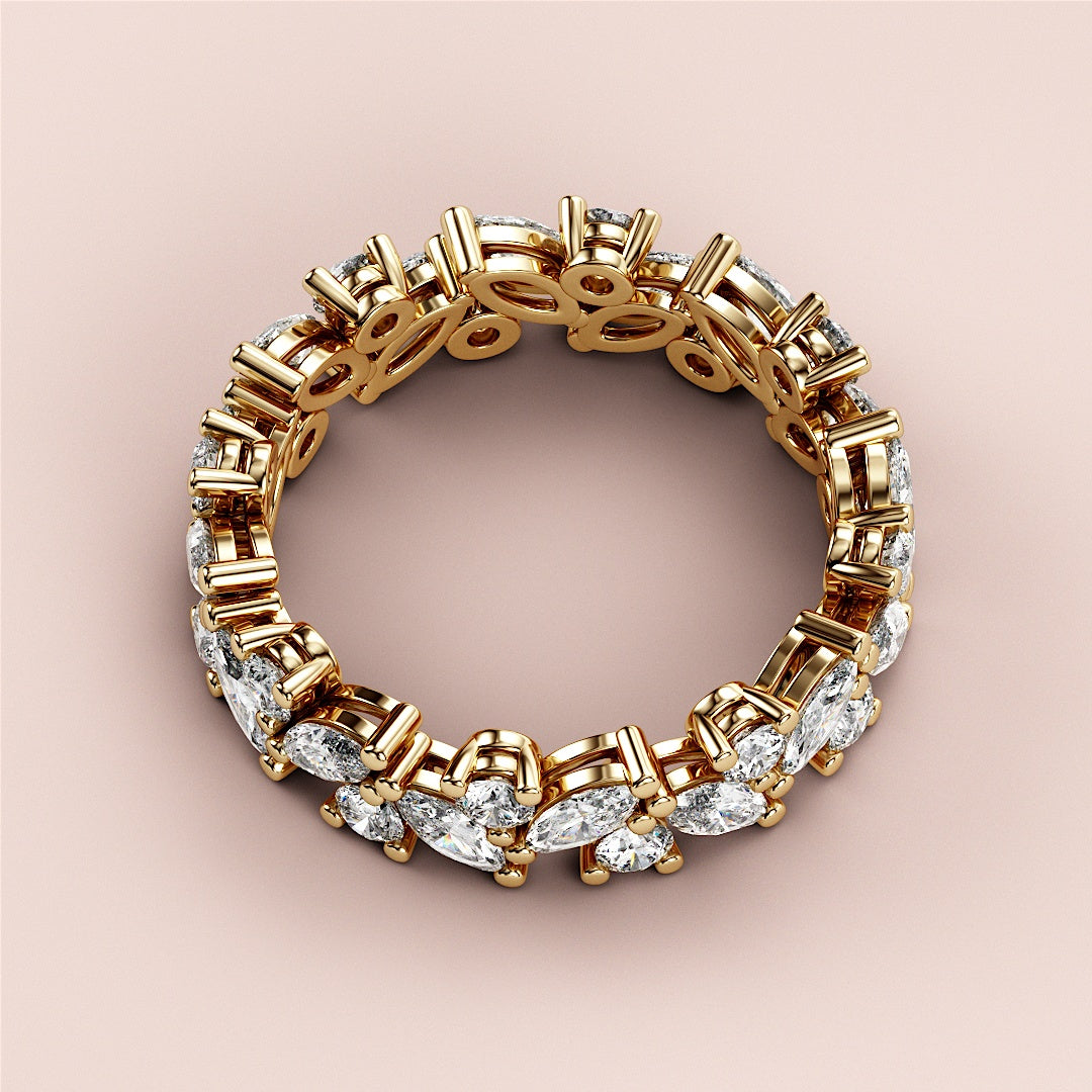 Luxurious 14K/18K yellow gold wedding band featuring marquise diamond shapes in an intricate floral design. |
 
 
 #14KRecycledYellowGold
 #18KRecycledYellowGold
