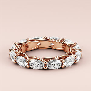 Elegant rose gold eternity band featuring marquise-cut diamonds, available in 14K and 18K gold or platinum.  Wedding band design. 