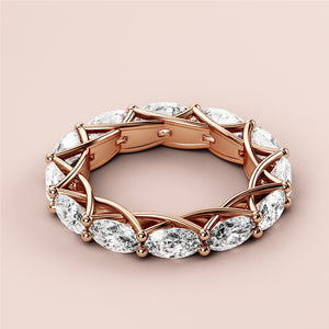 Elegant 14K Rose Gold wedding band featuring marquise-cut diamonds in a trellis design, showcasing unique craftsmanship. 
