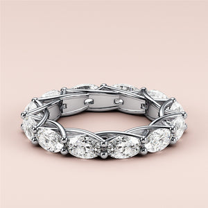 Elegant white gold wedding band featuring an oval eternity trellis design, available in 14K or 18K gold or platinum. 