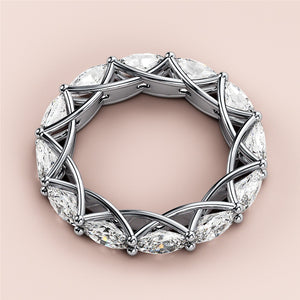 Elegant 14K or 18K white gold eternity band featuring marquise-cut diamonds in a unique criss-cross design. 