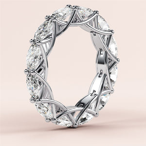 Luxurious 14K white gold eternity band with marquise-cut diamonds, showcasing impeccable craftsmanship and elegance for weddings. 