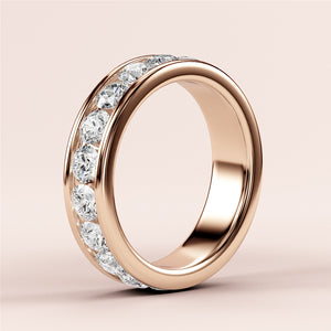 Rose gold or platinum eternity wedding band with round-cut diamonds; side view highlighting the brilliant 14K and 18K options. 