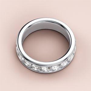 Elegant white gold wedding band featuring a diamond channel set design, available in 14K, 18K, or platinum, showcasing brilliant round diamonds. 
