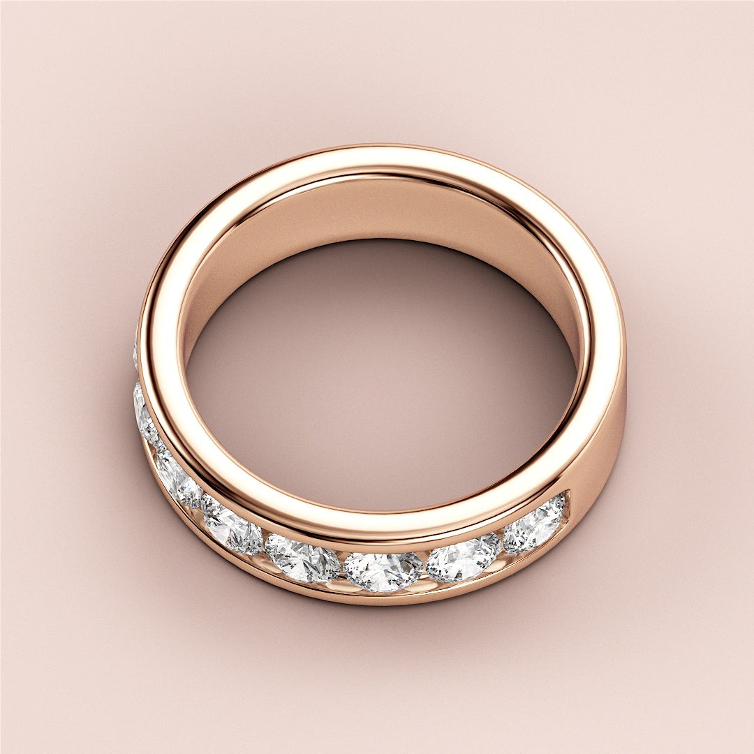 Elegant 14K and 18K rose gold half eternity wedding band with round brilliant-cut diamonds for timeless sophistication. 