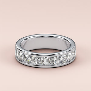 Luxurious 14K White Gold wedding band featuring a channel-set row of dazzling round diamonds for a contemporary, sophisticated look. 