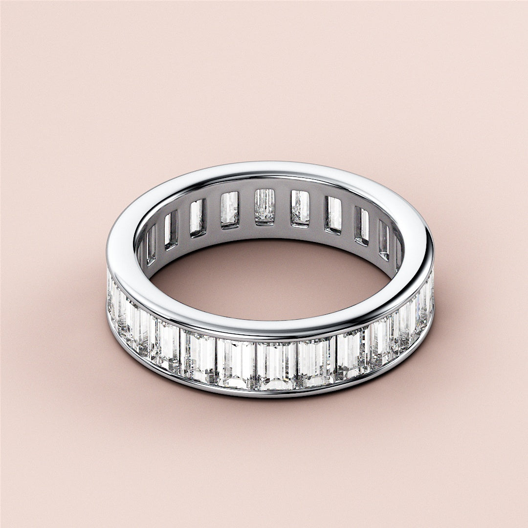 Elegant 14K or 18K white gold baguette diamond eternity wedding band featuring sparkling baguette-cut diamonds in a classic design. |
 #14KRecycledWhiteGold
 #18KRecycledWhiteGold
 
 
 
 
 #Platinum