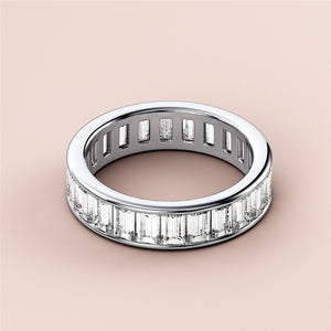 Elegant 14K or 18K white gold baguette diamond eternity wedding band featuring sparkling baguette-cut diamonds in a classic design. 
