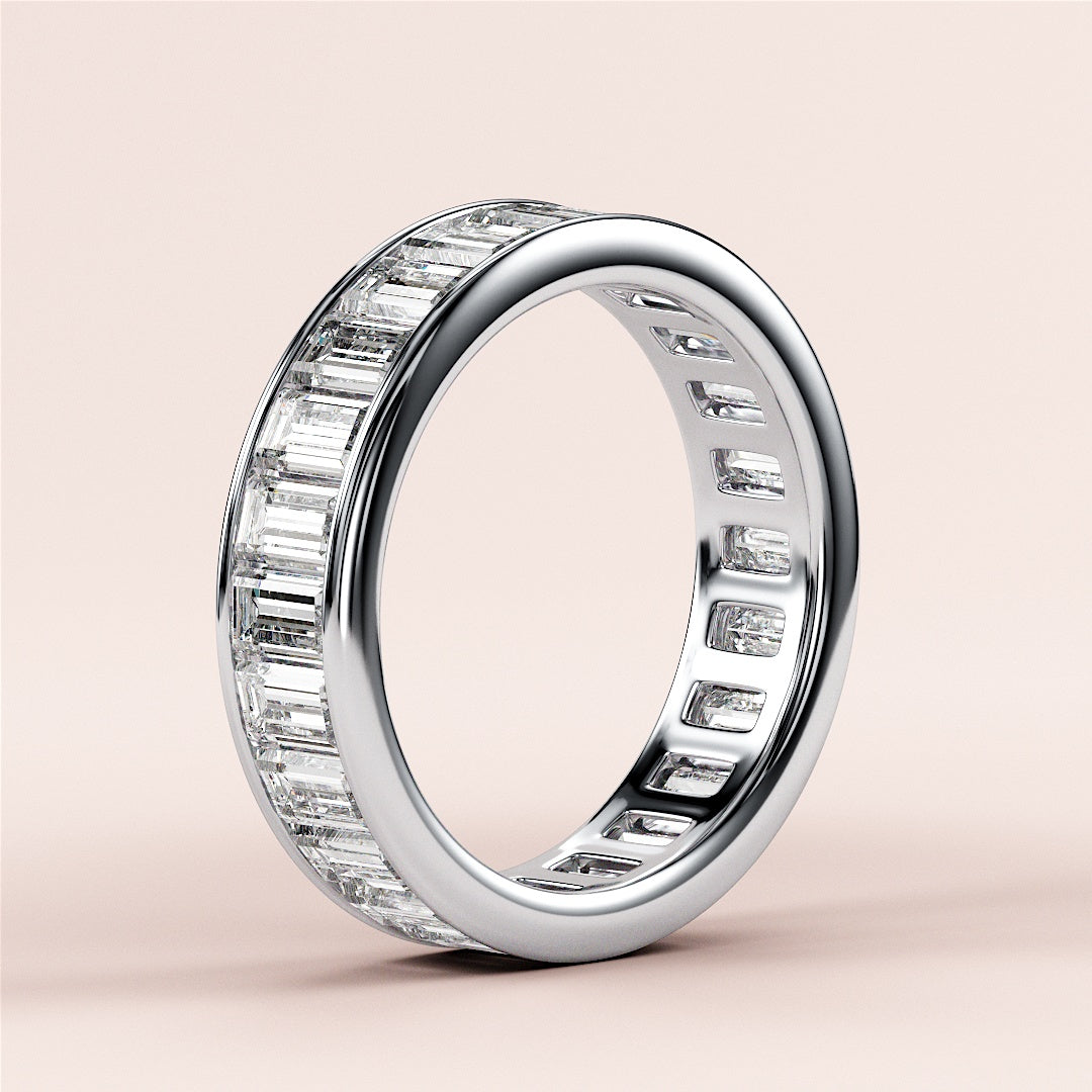 Elegant 14K or 18K white gold emerald-cut diamond eternity wedding band featuring a seamless row of elongated facets. |
 #14KRecycledWhiteGold
 #18KRecycledWhiteGold
 
 
 
 
 #Platinum