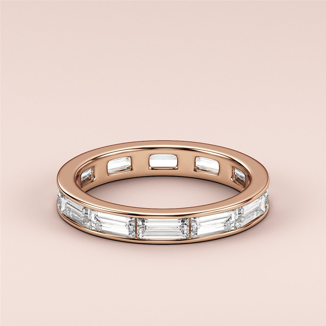 Rose gold wedding band featuring sparkling baguette-cut diamonds, available in 14K, 18K gold or platinum, perfect for eternity. |
 
 
 
 
 #14KRecycledRoseGold
 #18KRecycledRoseGold