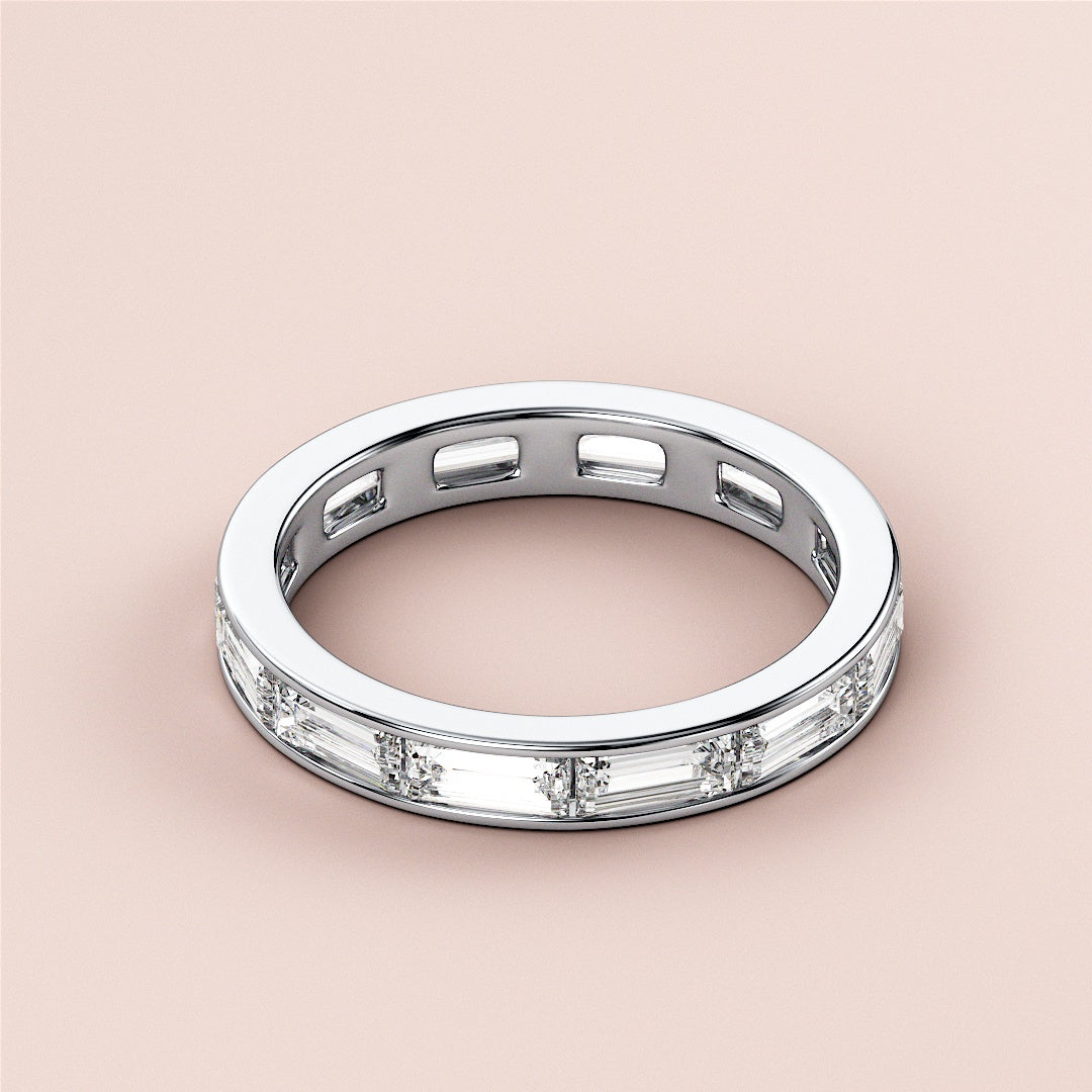 Elegant 14K white gold wedding band featuring channel-set baguette diamonds, perfect for eternal love and timeless style. |
 #14KRecycledWhiteGold
 #18KRecycledWhiteGold
 
 
 
 
 #Platinum