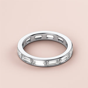 Elegant 14K white gold wedding band featuring channel-set baguette diamonds, perfect for eternal love and timeless style. 