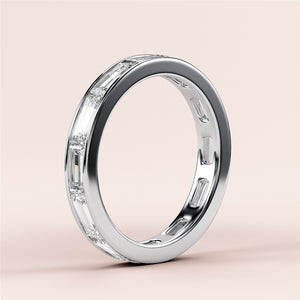 Elegant 14K or 18K gold eternity band featuring baguette-cut diamonds.  Perfect for weddings or daily wear. 