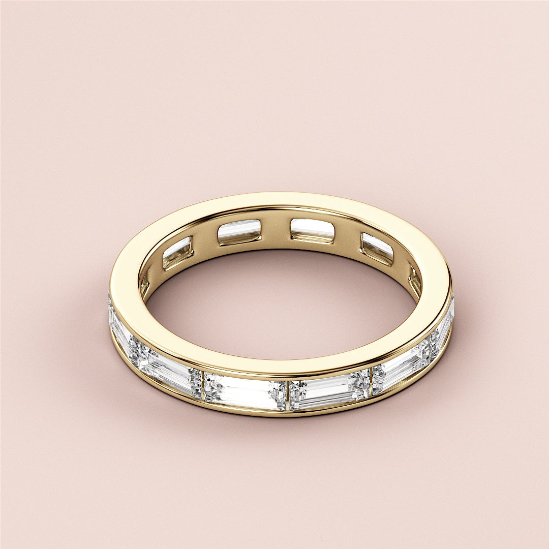 Elegant 14K/18K yellow gold baguette channel-set eternity wedding band, perfect for lasting love. |
 
 
 #14KRecycledYellowGold
 #18KRecycledYellowGold