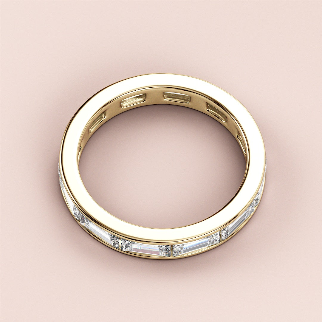 Elegant 14K gold wedding band featuring radiant baguette-cut diamonds in a timeless eternity design. Perfect for a lasting love. |
 
 
 #14KRecycledYellowGold
 #18KRecycledYellowGold