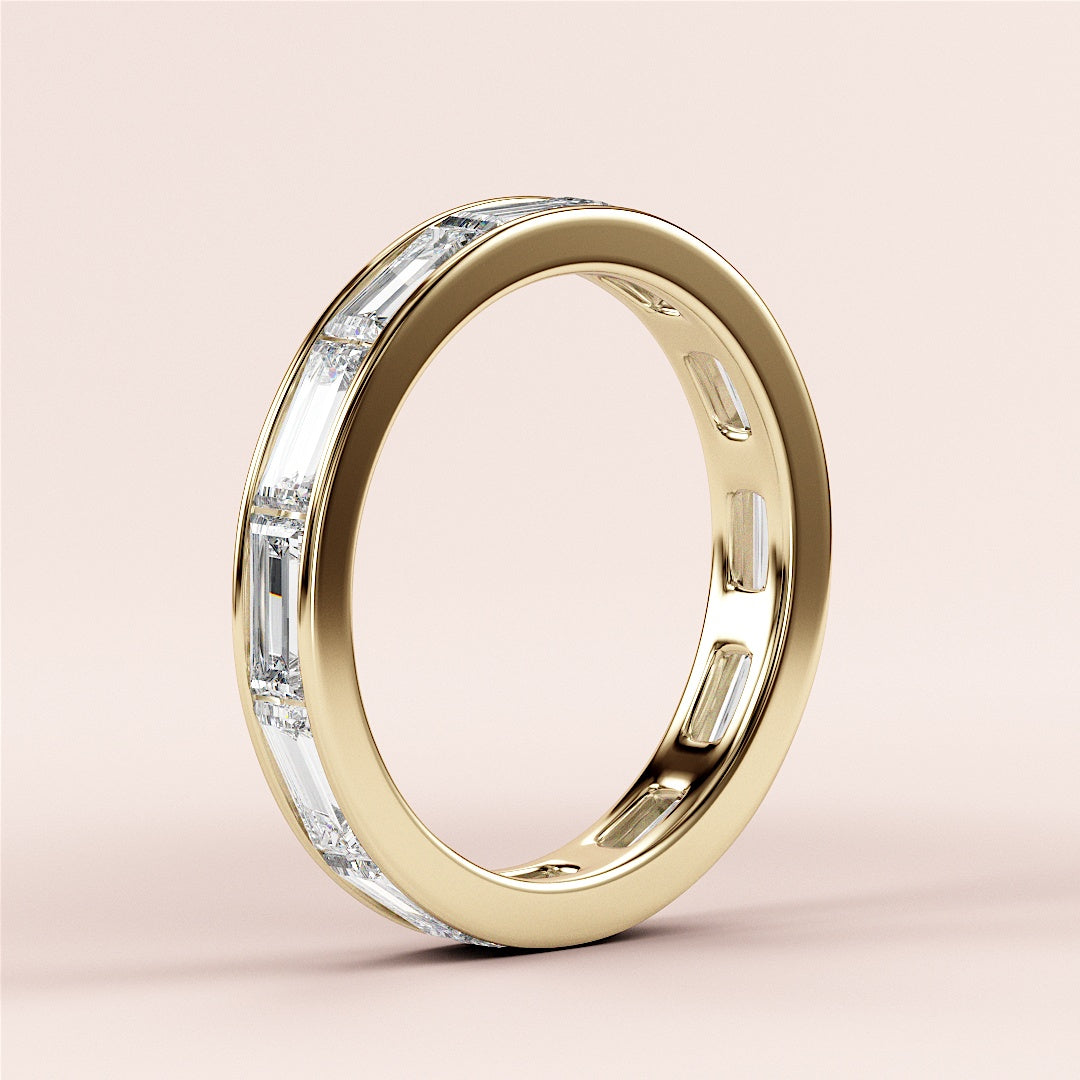 Elegant 14K Gold baguette channel eternity wedding band, featuring a refined diamond cut design for timeless beauty. |
 
 
 #14KRecycledYellowGold
 #18KRecycledYellowGold