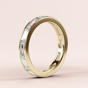 Elegant 14K Gold baguette channel eternity wedding band, featuring a refined diamond cut design for timeless beauty. 