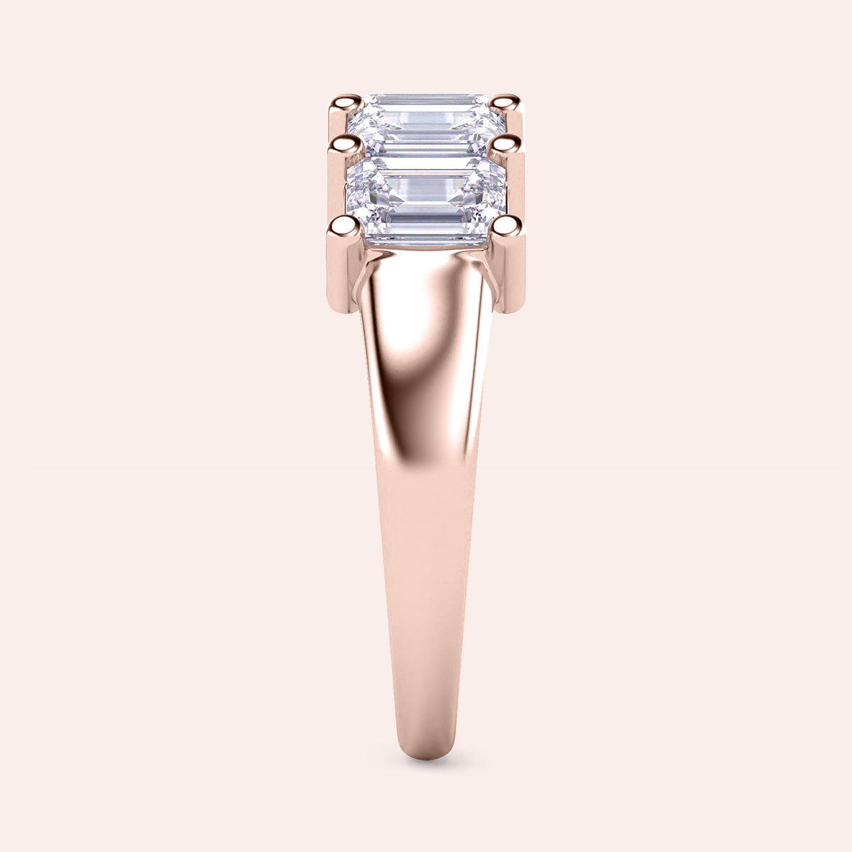 14K Rose Gold wedding band featuring five elegant emerald-cut diamonds, perfect for eternal love. 
