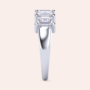 Elegant 14K white gold wedding band featuring five emerald-cut diamonds, ideal for special occasions and luxurious everyday wear. 