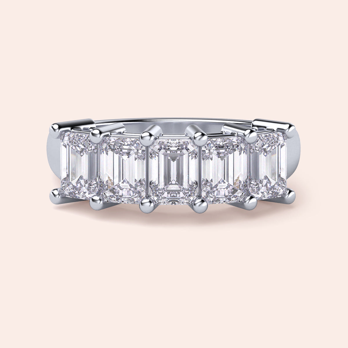 Front view of a stunning 14K/18K white gold wedding band featuring five emerald-cut diamonds, perfect for eternity. 