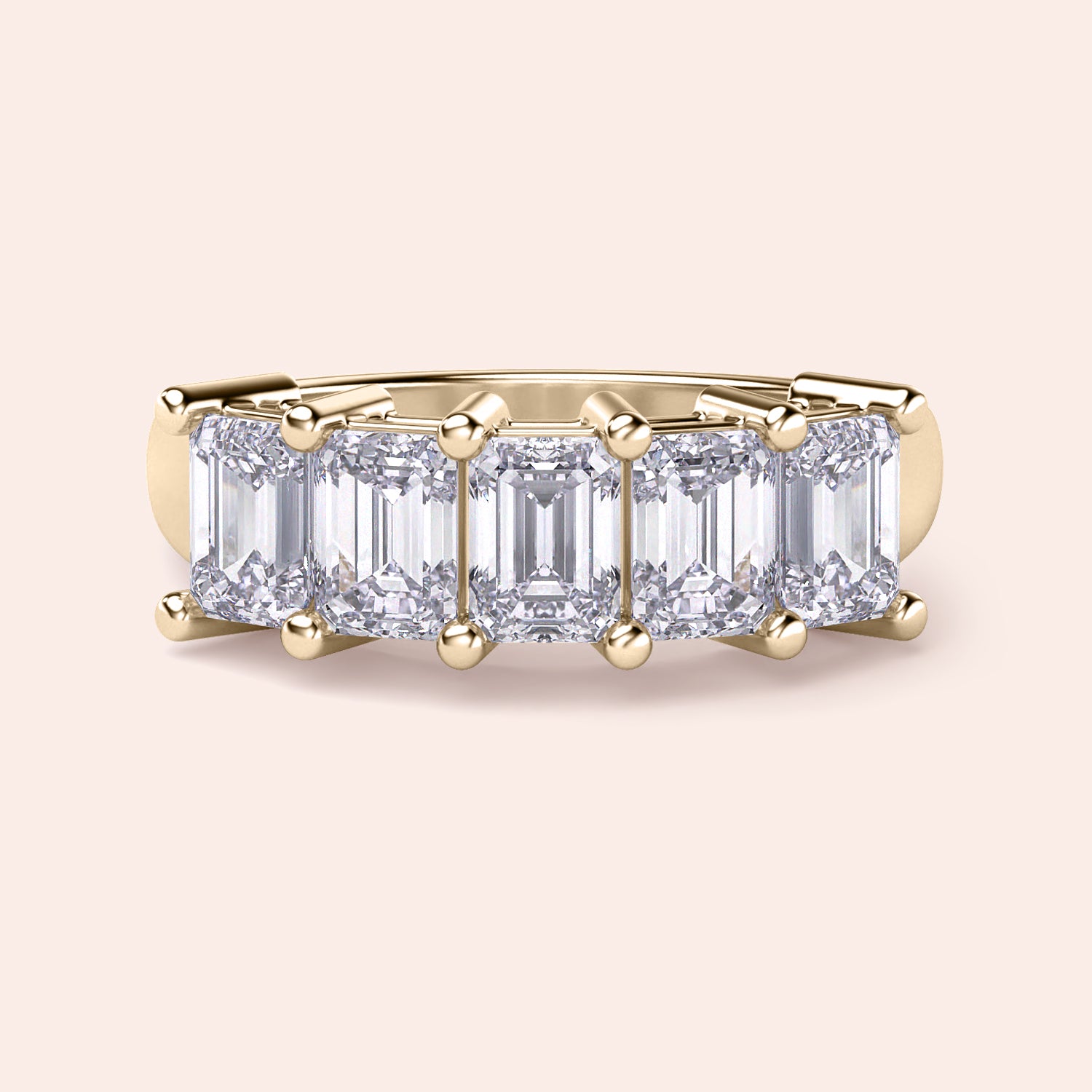 Stunning 14K Yellow Gold wedding band featuring a five-stone emerald-cut diamond design for a timeless and elegant look. 