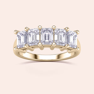 Elegant 14K yellow gold five-stone wedding band featuring Asscher-cut diamonds for a timeless spark. Perfect for eternity. 