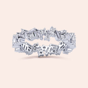 Exquisite 14K or 18K white gold eternity band ring with baguette and round diamonds, perfect for weddings or special occasions. 
