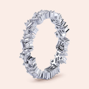 Elegant 14K and 18K gold or platinum diamond eternity band with baguette cut diamonds, perfect for weddings or special occasions. 