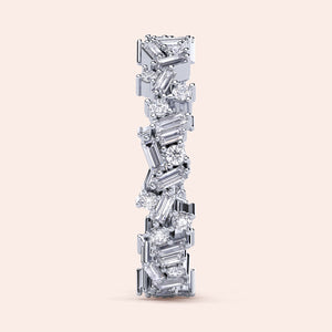 Stunning 14K or 18K white gold baguette and round diamond eternity wedding band, elegantly showcasing intricate design. 