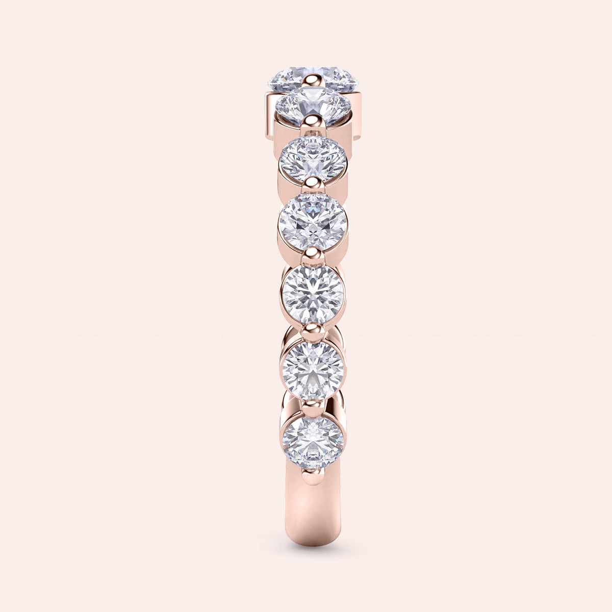 14K Rose Gold Diamond Eternity Ring with round brilliant-cut diamonds in shared prong setting, perfect for weddings and anniversaries. 