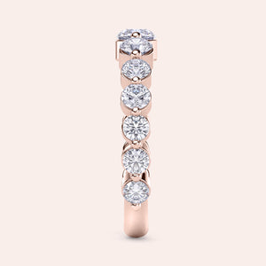 14K Rose Gold Diamond Eternity Ring with round brilliant-cut diamonds in shared prong setting, perfect for weddings and anniversaries. 