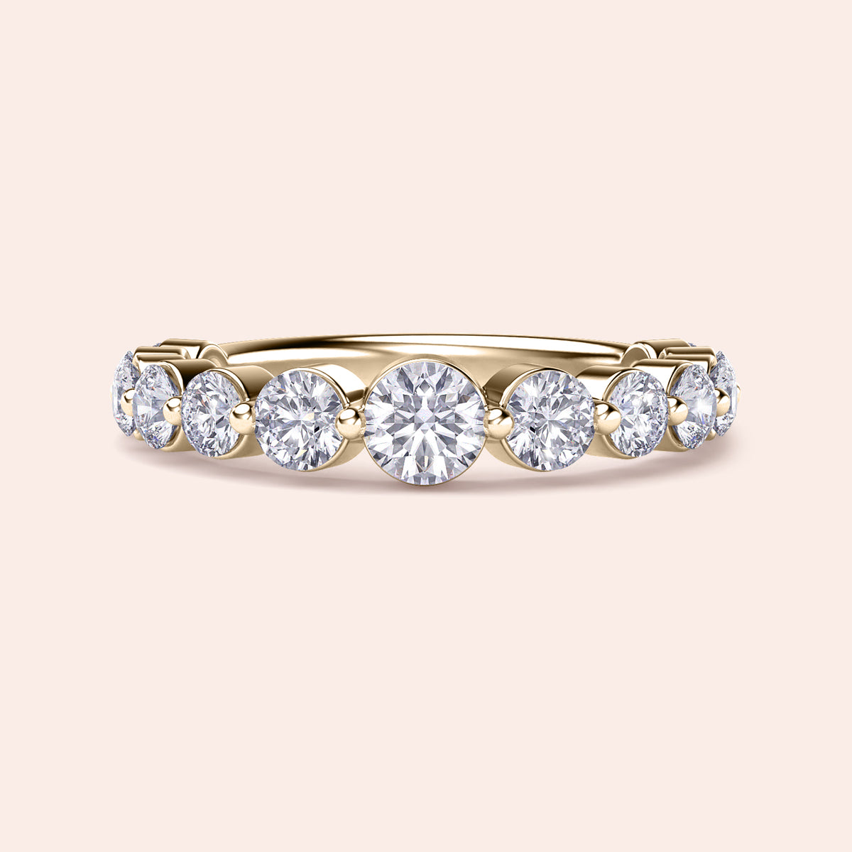 Elegant yellow gold wedding band with shared prong round diamonds, available in 14K, 18K, or platinum for timeless luxury. 