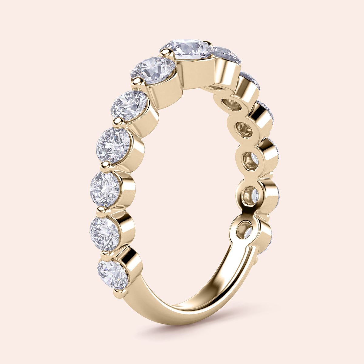 Elegant 14K gold wedding band with shared prong round brilliant diamonds, perfect for special occasions or everyday elegance. 