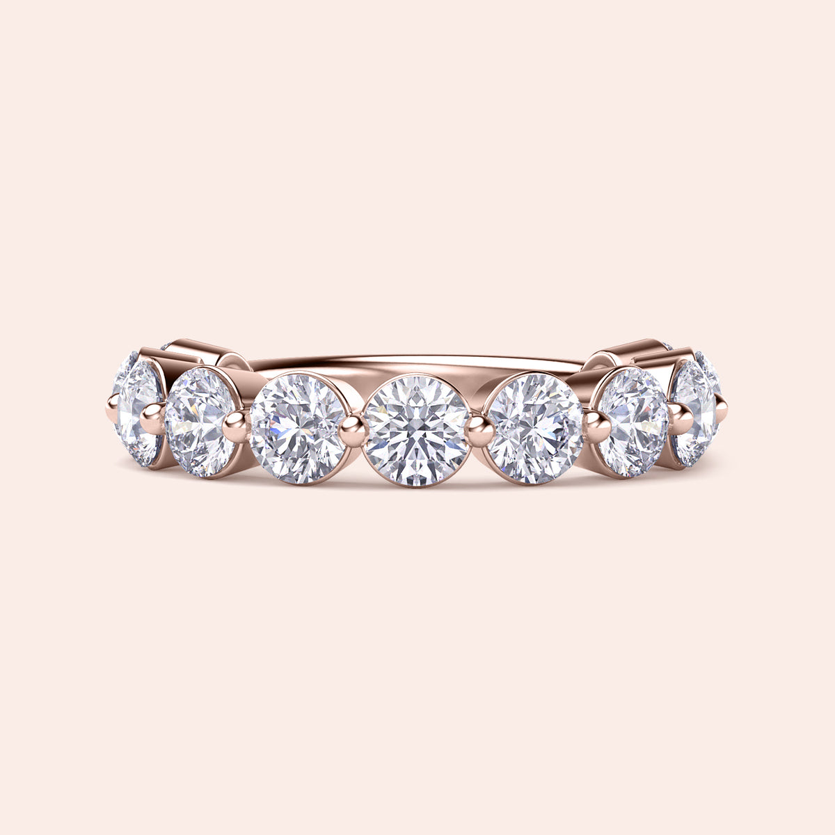 Elegant 14K or 18K rose gold eternity band with round brilliant-cut diamonds, symbolizing timeless beauty and wedding bliss. 