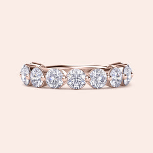 Elegant 14K or 18K rose gold eternity band with round brilliant-cut diamonds, symbolizing timeless beauty and wedding bliss. 