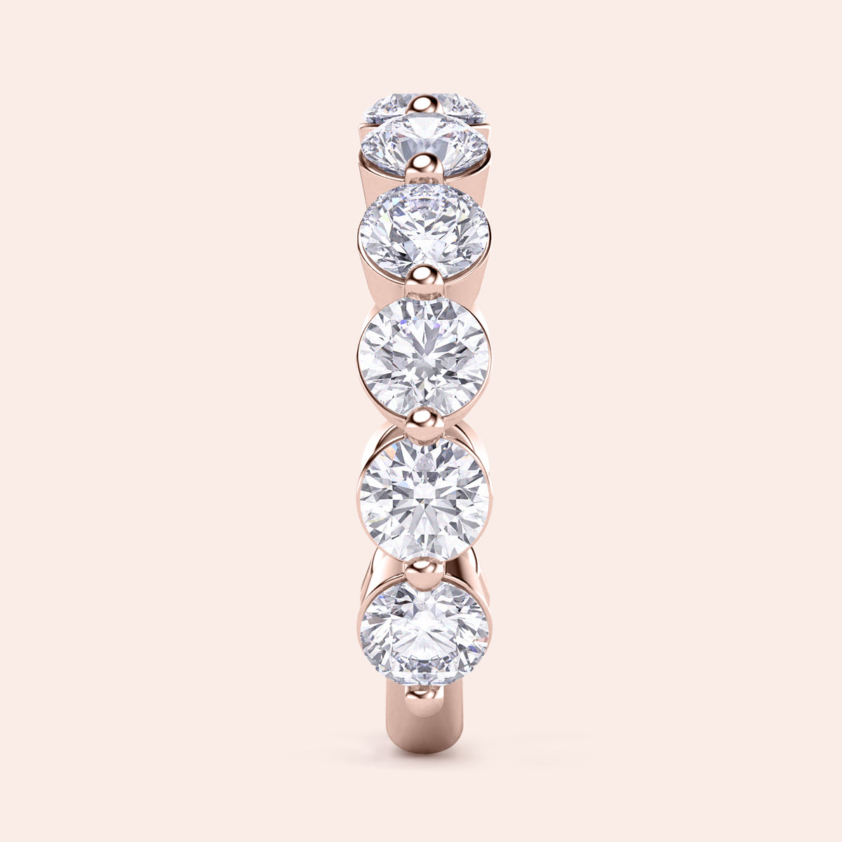 Elegant 14K rose gold wedding band with round brilliant cut diamonds, perfect for weddings and anniversaries. 