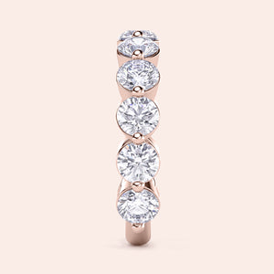 Elegant 14K rose gold wedding band with round brilliant cut diamonds, perfect for weddings and anniversaries. 