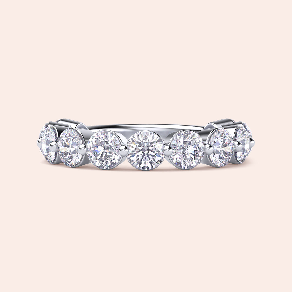 Elegant white gold wedding band featuring round brilliant-cut diamonds, available in 14K, 18K, and platinum settings. 
