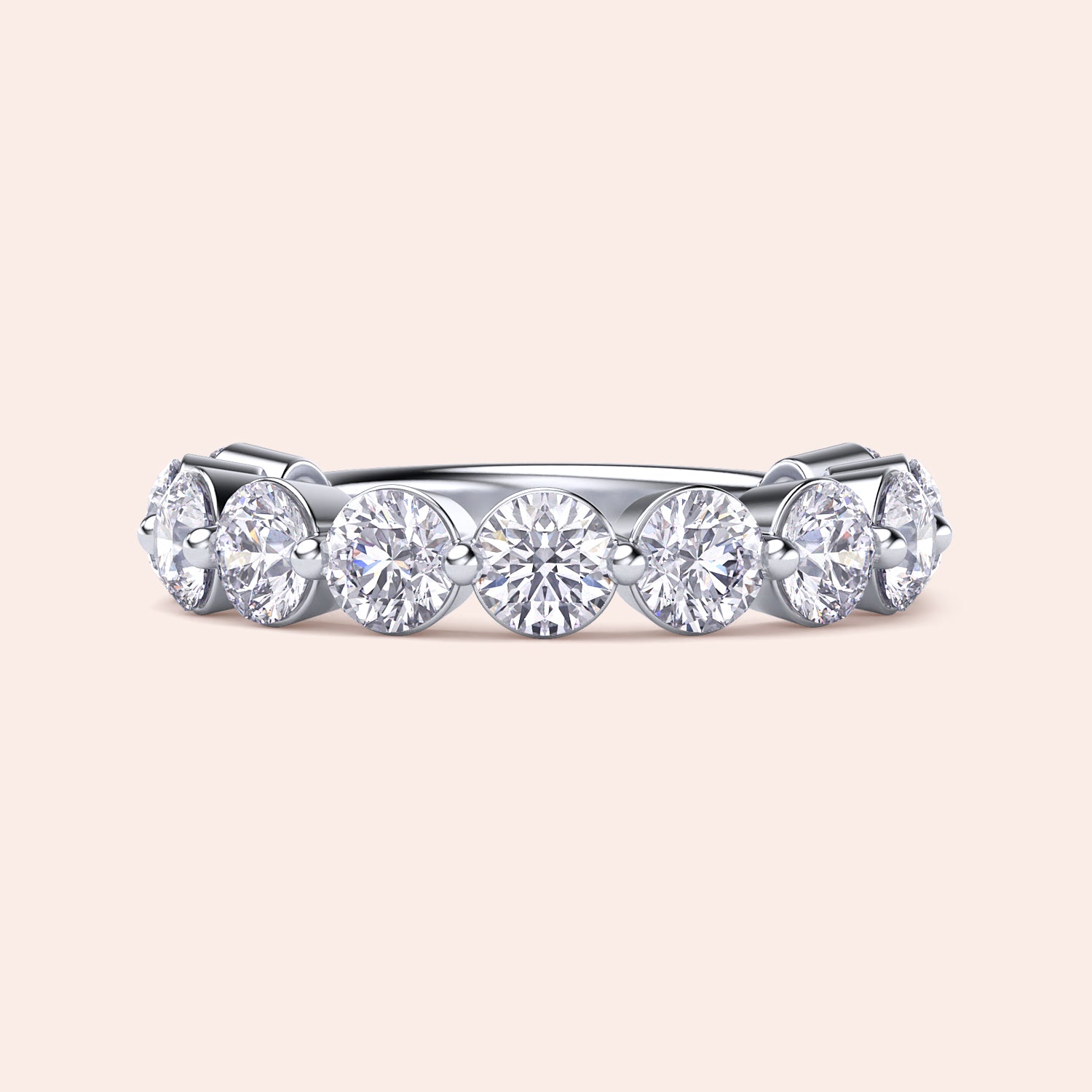 Elegant white gold wedding band featuring round brilliant-cut diamonds, available in 14K, 18K, and platinum settings. 