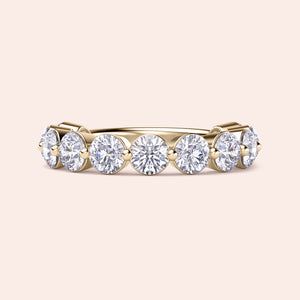 Elegant 14K Yellow Gold wedding band featuring five round diamond stones, perfect for adding sophistication to any look. 