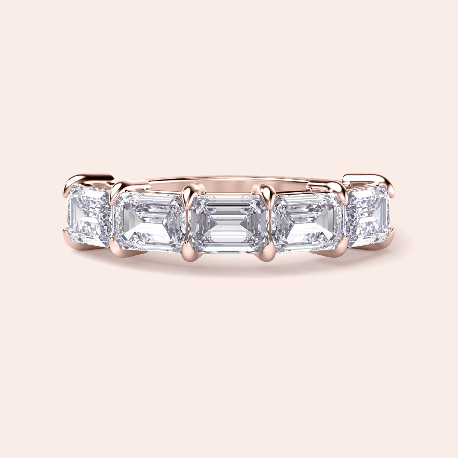 Elegant rose gold wedding band featuring five emerald-cut stones, available in 14K and 18K gold or platinum. |
 
 
 
 
 #14KRecycledRoseGold
 #18KRecycledRoseGold