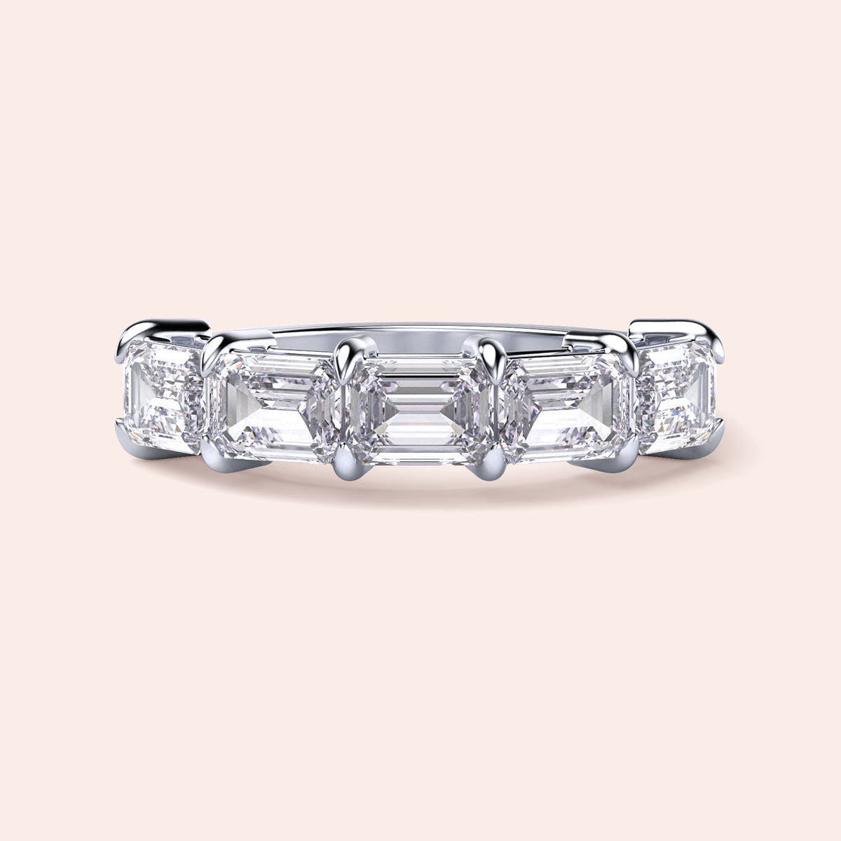 Side view of a luxurious five-stone wedding band featuring emerald-cut diamonds, set in 14K or 18K white gold or platinum.