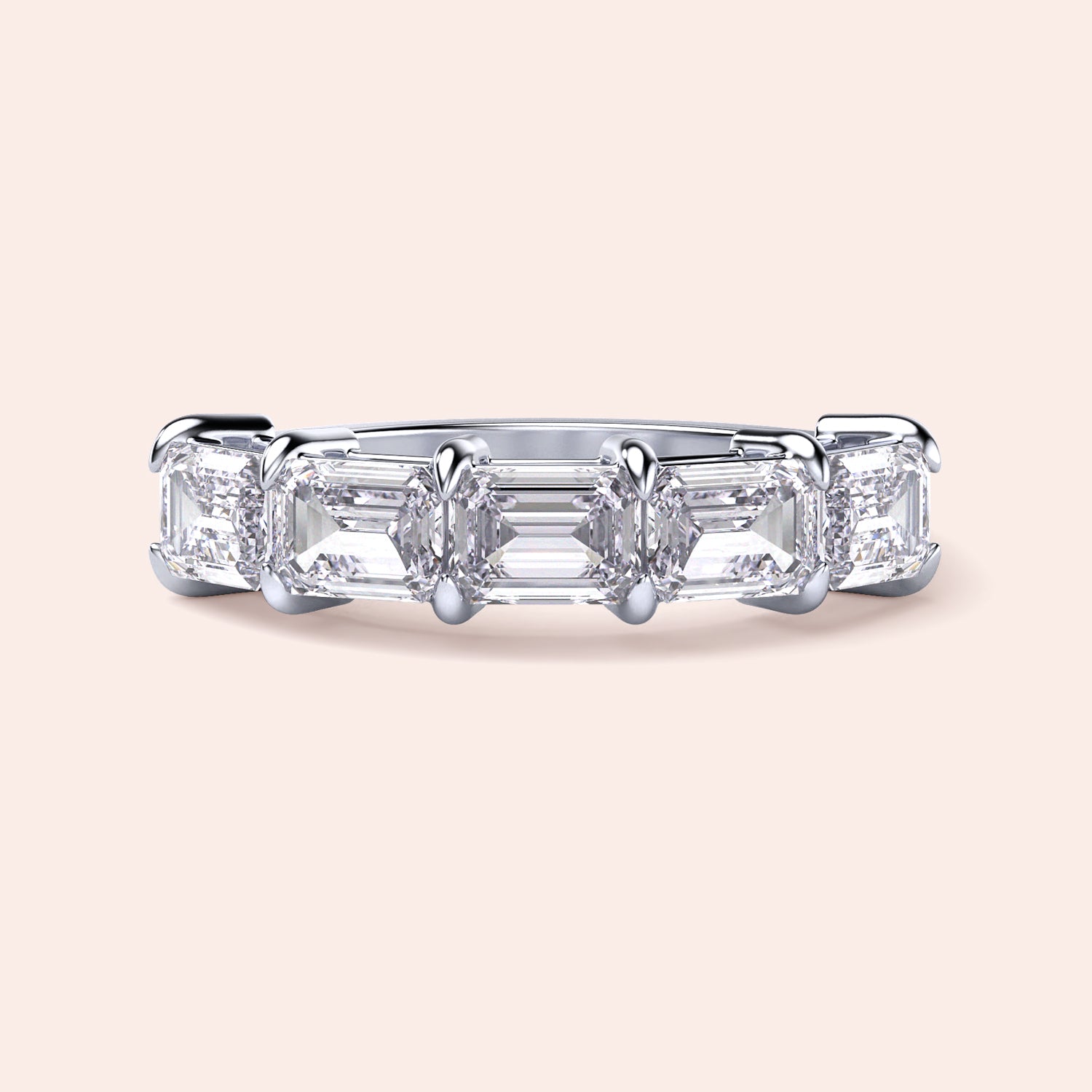 Side view of a luxurious five-stone wedding band featuring emerald-cut diamonds, set in 14K or 18K white gold or platinum.